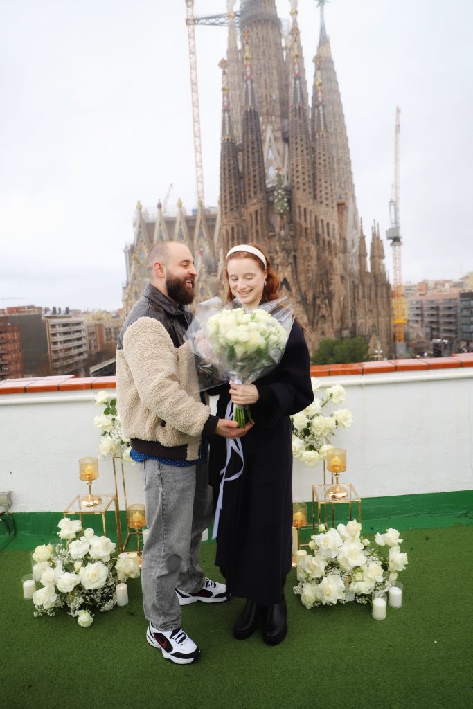 Romantic proposal Barcelona with candles and floral decor